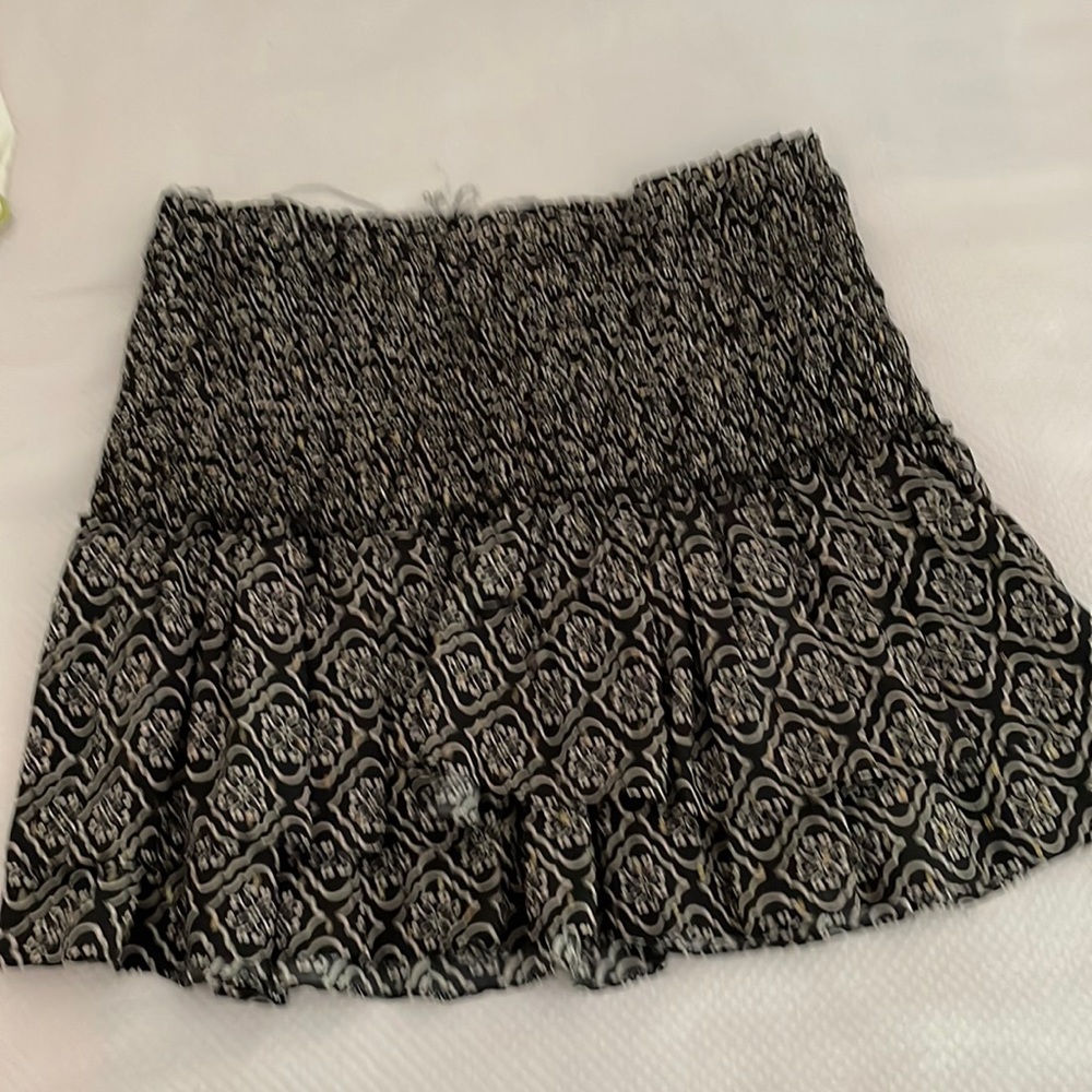 Black with medallion motif ruffle mini skirt
